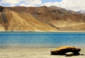 an attempt to portray the different sizes of nature's creation amidst pangong lake