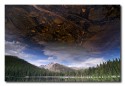 Usually I am against rotating images. I always like to show the nature as it is. However I found this image interesting when flipped upside down. I used CL Polirized filter to get the dead branches, stones in lake bed. This is Bear Lake in Rocky Mountain National Park, CO at an altitide of 9400ft. Nikon DX format, Full frame, 12mm, 1/8 sec, hand held. Appreciate your views.