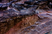 A rock abstract creates these patterns so full of energy and color .