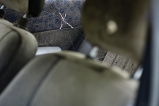 This is a Signature spider inside an old, abandoned taxi.  :D